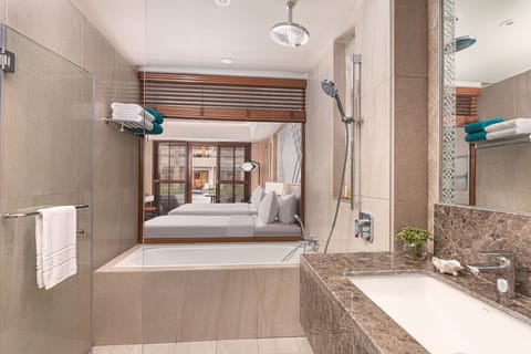 Premier Room with Direct Pool Access | Bathroom | Hair dryer, bidet, towels