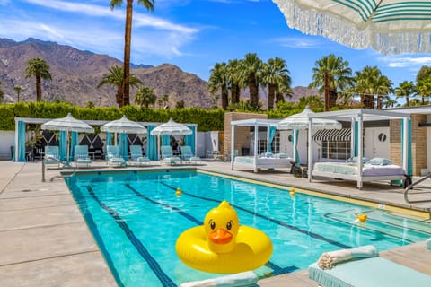 Outdoor pool, free cabanas, pool umbrellas