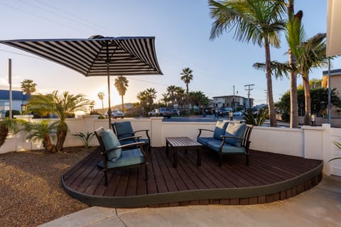 Located one block from the beach, this truly is a Coastal Carlsbad Surfer's Dream!