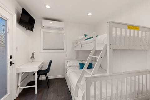 The fourth room offers a Twin over Full bunk bed for added sleeping arrangements
