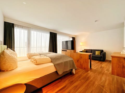 Junior Suite | In-room safe, blackout drapes, iron/ironing board, free WiFi