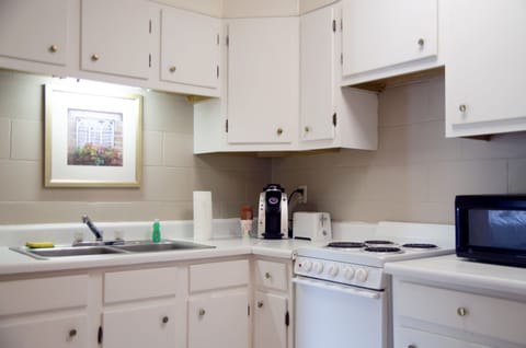 Standard Suite, 1 Bedroom | Private kitchen | Full-size fridge, microwave, stovetop, coffee/tea maker