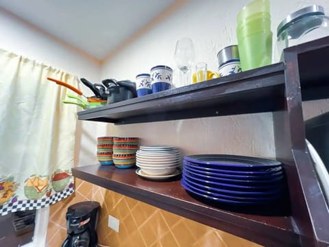 Standard Villa | Private kitchen | Fridge, microwave, stovetop, cookware/dishes/utensils