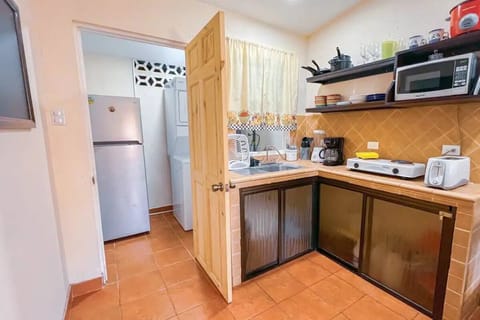 Standard Villa | Private kitchen | Fridge, microwave, stovetop, cookware/dishes/utensils