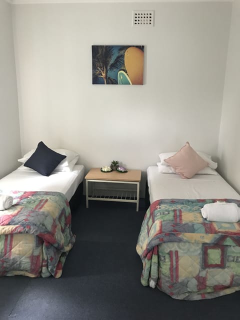 Standard Room, Shared Bathroom (Hotel Single) | Iron/ironing board, bed sheets