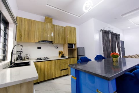 Apartment | Private kitchen | Full-size fridge, microwave, blender, griddle