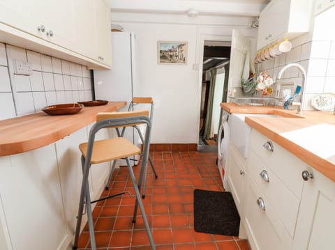 Fridge, electric kettle, toaster, cookware/dishes/utensils