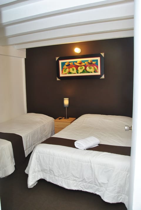 Quadruple Room, Private Bathroom | Iron/ironing board, free WiFi, bed sheets