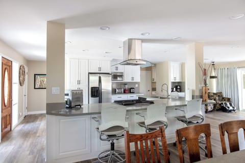 Spacious kitchen stocked with everything you might need and more.