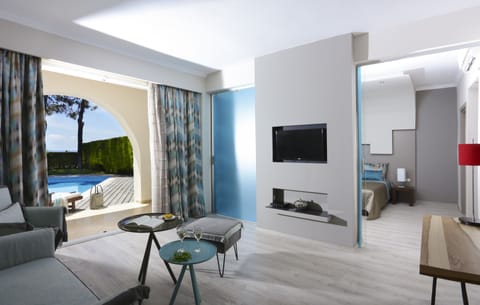 Grand Suite, Private Pool | Living room | 21-inch flat-screen TV with satellite channels, TV