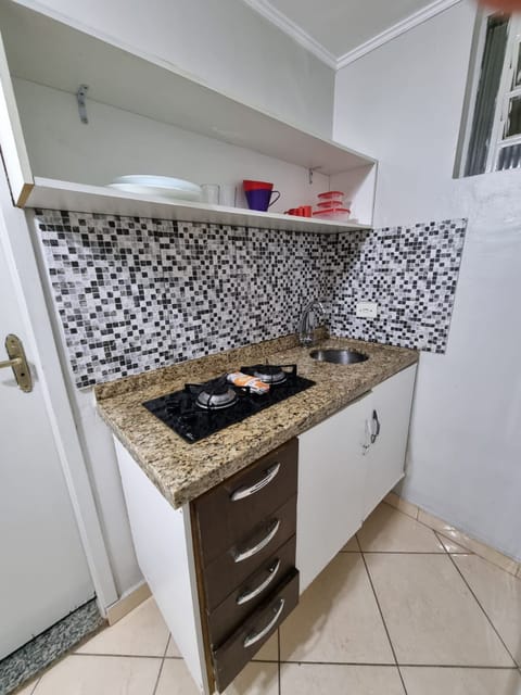 Studio | Private kitchen | Fridge, microwave, cookware/dishes/utensils, dining tables