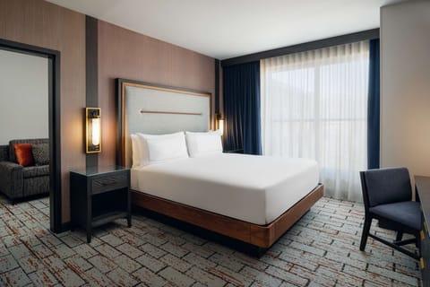 Suite, 1 King Bed | Premium bedding, in-room safe, laptop workspace, blackout drapes