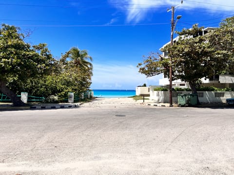 Beach nearby, white sand, sun loungers, beach umbrellas