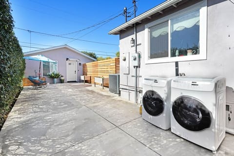 Laundry machines are free to be used during your stay in this rear-house retreat.
