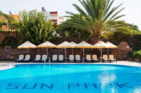 2 outdoor pools, open 8:00 AM to 7:00 PM, pool umbrellas, sun loungers