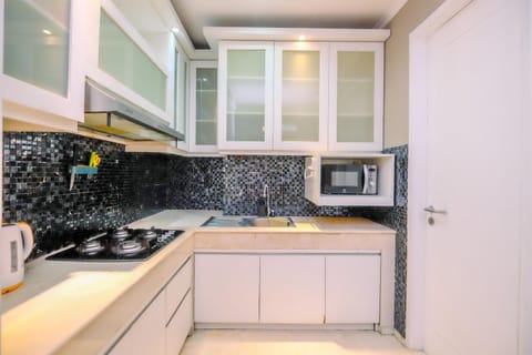 Apartment | Private kitchen | Full-size fridge, stovetop