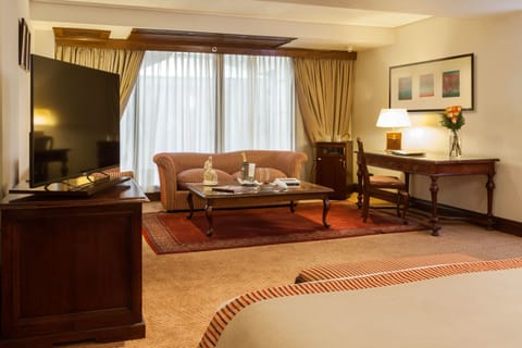 Junior Suite, 1 King Bed | Premium bedding, down comforters, minibar, in-room safe