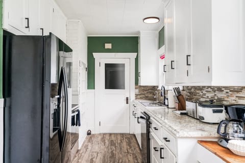 Fully stocked kitchen; stainless steel appliances & everything needed for meals