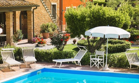 Seasonal outdoor pool, pool umbrellas, sun loungers