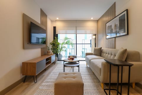 Apartment, 2 Bedrooms (204) | Living area | 40-inch Smart TV with cable channels