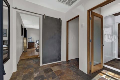 Barn style door to separate the bedroom.