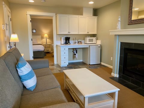 Accessible Queen Suite with Sofabed, 1st Floor, Non-Pet | Living area | 50-inch flat-screen TV with cable channels, TV, DVD player