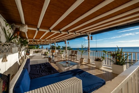 2 bars/lounges, poolside bar, beach bar