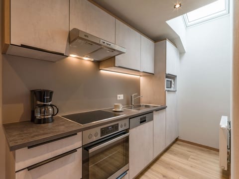 Panoramic Apartment | Private kitchen | Full-size fridge, microwave, oven, coffee/tea maker