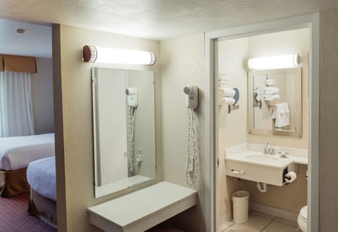 Standard Double Room, 2 Queen Beds | Bathroom | Hair dryer, towels, soap, shampoo