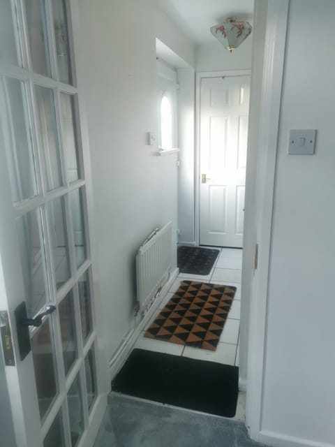 Your entrance way out of the house. You have your own set of keys.