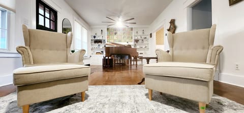 First Living Room with Playing Grand Piano