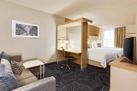 Suite, Multiple Beds | Living area | TV