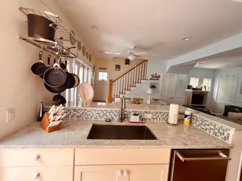 Effortless cleanup is a breeze with the large sink and dishwasher.