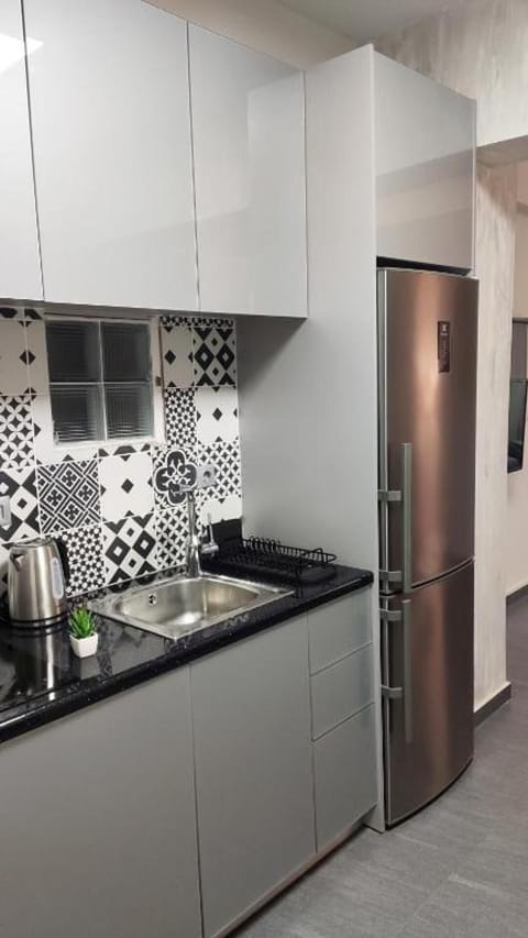 Apartment | Private kitchen | Fridge, microwave, stovetop, electric kettle