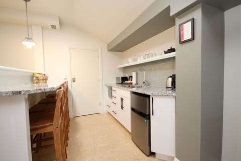 King Suite 5 | Private kitchenette | Fridge, coffee/tea maker, cookware/dishes/utensils