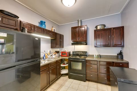 House (4 Bedrooms) | Private kitchen | Microwave, oven, stovetop, highchair