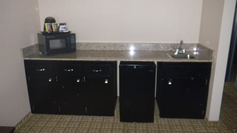 Suite, Two Queen Beds, Non-Smoking | Living area | 42-inch LCD TV with cable channels, TV