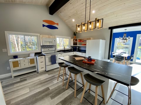 Panoramic views of the creek from the kitchen & dining areas