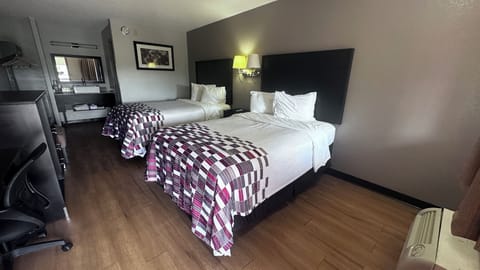 Deluxe Room, 2 Double Beds, Non Smoking | Desk, laptop workspace, blackout drapes, iron/ironing board