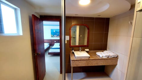 Standard Triple Room, Multiple Beds | Bathroom | Shower, free toiletries, towels, soap