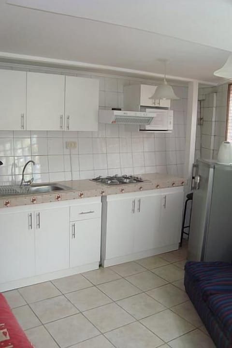 Traditional Apartment, 1 Bedroom | Private kitchen | Fridge, oven, stovetop, electric kettle