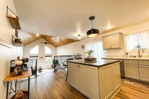 View of kitchen (right) and coffee bar (left) from the hallway.