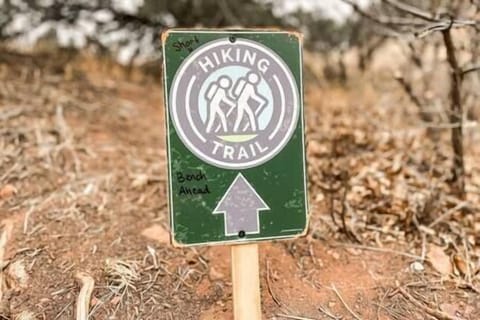 Follow the sign posted next to the hot tub to a private bench with views of Garden of the Gods!