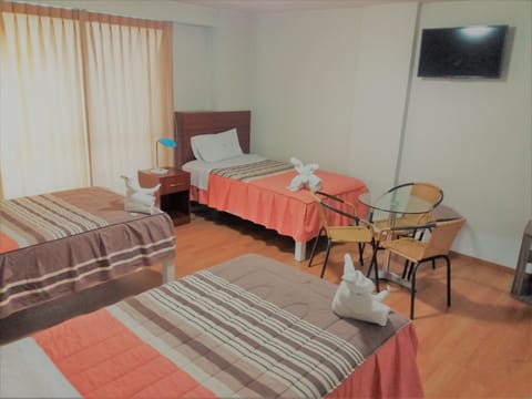 Triple Room | Down comforters, desk, iron/ironing board, free WiFi