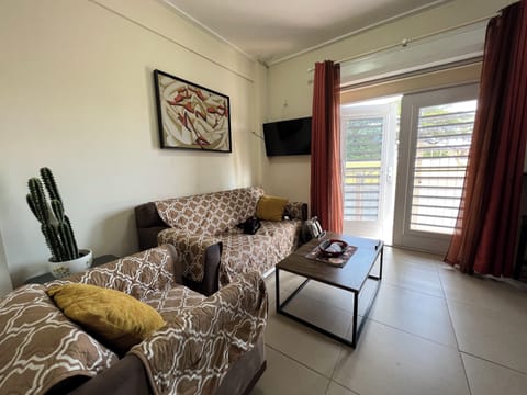 Deluxe Apartment, Multiple Beds, Non Smoking, Kitchenette | Living area | LED TV, Netflix