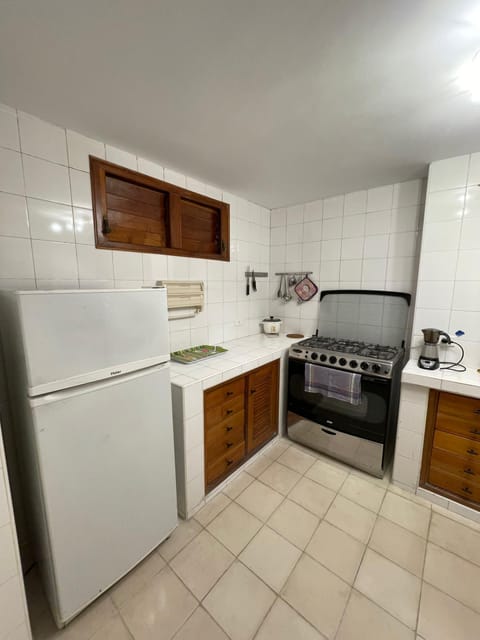 Elite Apartment | Private kitchen | Full-size fridge, rice cooker, cookware/dishes/utensils, freezer