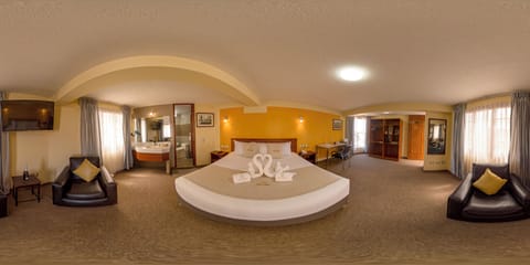 Superior Suite | Bathroom | Combined shower/tub, rainfall showerhead, hair dryer, towels