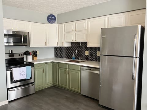 kitchen complete with work station sink