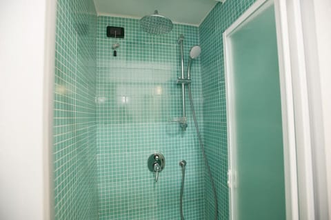 Economy Double or Twin Room | Bathroom | Shower, hair dryer, bathrobes, bidet