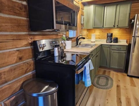 Full kitchen with appliances and supplies to cook if you desire.